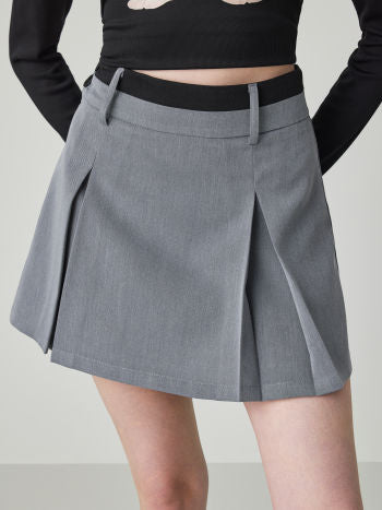 PATCHY WAIST SOLID PLEATED BUTTON MINI SKIRT