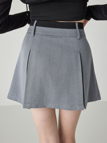 PATCHY WAIST SOLID PLEATED BUTTON MINI SKIRT